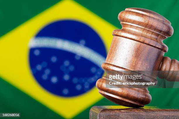 selective focus image of gavel against brazil flag - mallet hand tool stock pictures, royalty-free photos & images