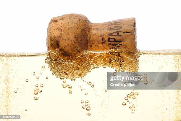 フローティングシャンパンのコルクの笛 - champagne cork ストックフォトと画像