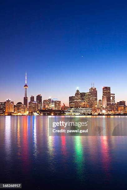 toronto skyline by night - toronto night stock pictures, royalty-free photos & images