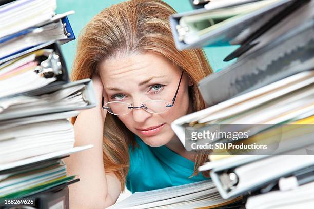 adult student or teacher frustrated with work to do - overworked teacher stock pictures, royalty-free photos & images