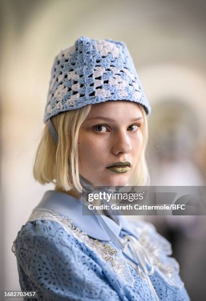 Model backstage ahead of the Bora Aksu show during London Fashion Week September 2023 at the Goodenough College on September 15, 2023 in London,...