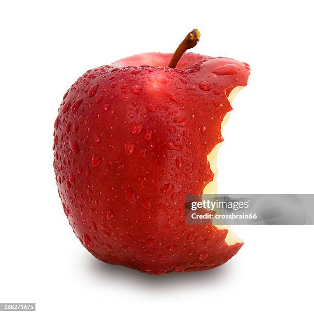 a single red apple with a bite taken out - missing bite stock pictures, royalty-free photos & images