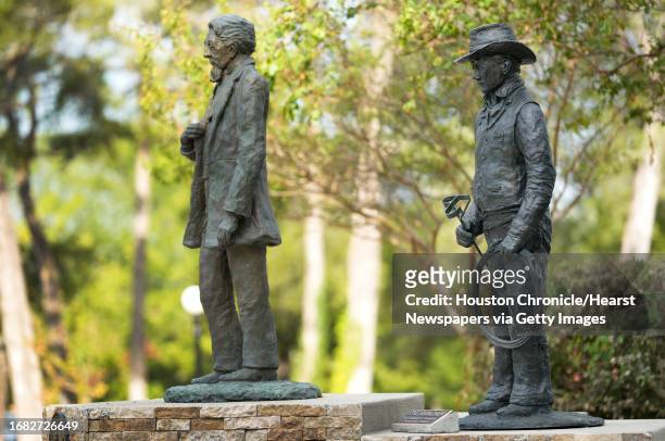 Statues of Charles B. Stewart, left, and The Rancher, right, are shown in Cedar Brake Park Wednesday, Sept. 13 in Montgomery. Sculptor Lynn Peverill...