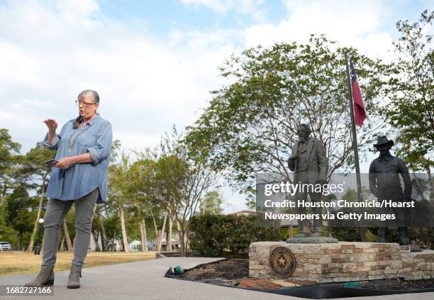 Sculptor Lynn Peverill talks about the new addition of The Rancher, shown right, to the Pioneers of Montgomery Monument in Cedar Brake Park...