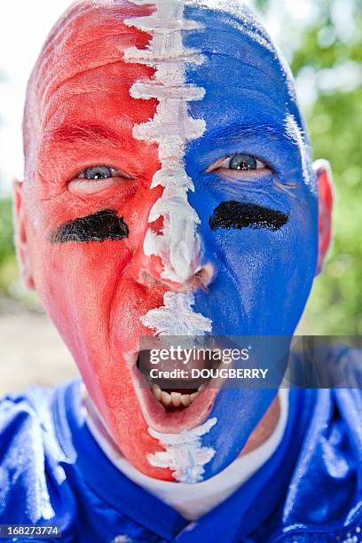 football fan - geschminkt gezicht stockfoto's en -beelden