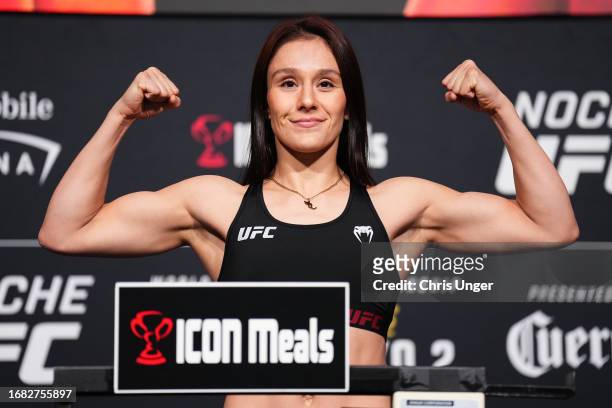 Alexa Grasso of Mexico poses on the scale during the Noche UFC official weigh-in at UFC APEX on September 15, 2023 in Las Vegas, Nevada.