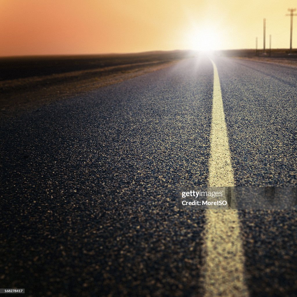 Desert Road Heading The Horizon at Sunset