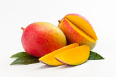 Fresh Slices of Mango on a Bed of Leaves