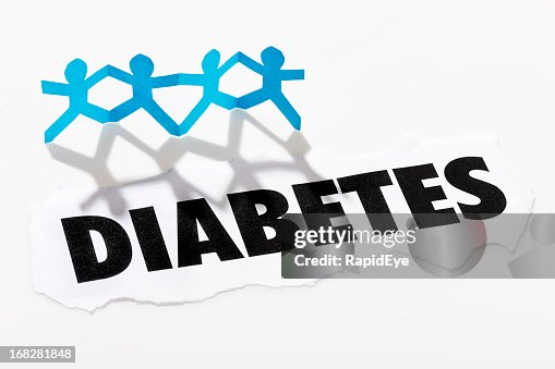 Headline "Diabetes" below four paper-chain cut-out people Headline "Diabetes" below four paper-chain cut-out people