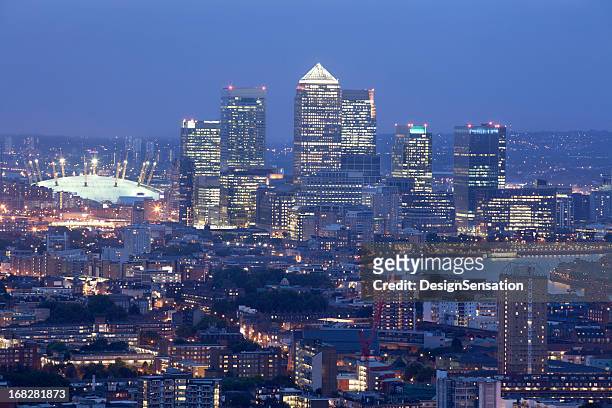 canary wharf skyline at dusk (xxxl) - the o2 england stock pictures, royalty-free photos & images