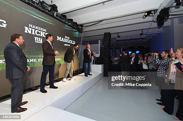 Senior Vice President, Ad Sales, Keith Kazerman, NFL Players Eli Manning, Hakeem Nicks, and Nick Mangold speak onstage at DIRECTV's 2013 National Ad...