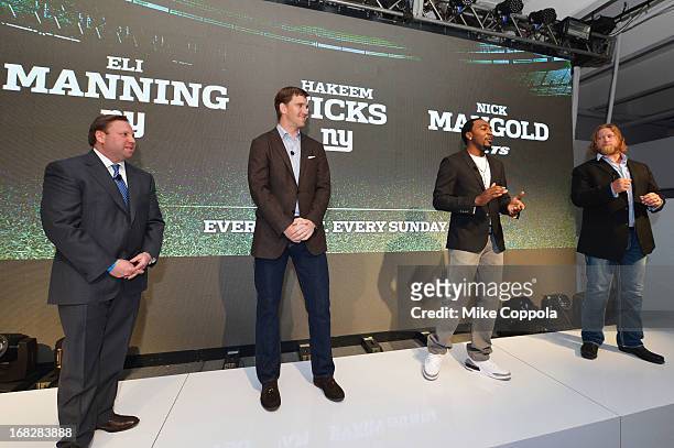 Senior Vice President, Ad Sales, Keith Kazerman, NFL Players Eli Manning, Hakeem Nicks, and Nick Mangold speak onstage at DIRECTV's 2013 National Ad...