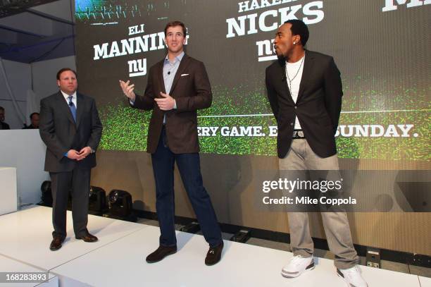 Senior Vice President, Ad Sales, Keith Kazerman, NFL Players Eli Manning and Hakeem Nicks speak onstage at DIRECTV's 2013 National Ad Sales Upfront...