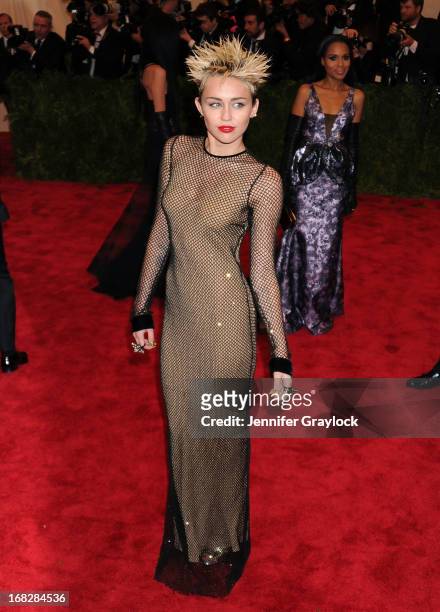 Actress Miley Cyrus attends the Costume Institute Gala for the "PUNK: Chaos to Couture" exhibition at the Metropolitan Museum of Art on May 6, 2013...