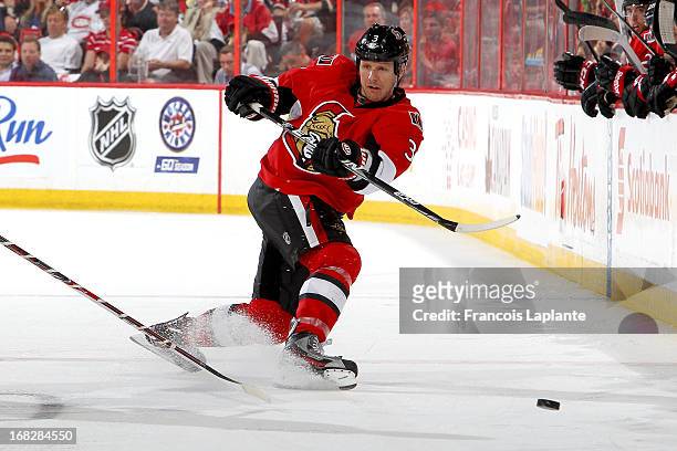 Marc Methot of the Ottawa Senators shoots the puck against the Montreal Canadiens in Game Three of the Eastern Conference Quarterfinals during the...