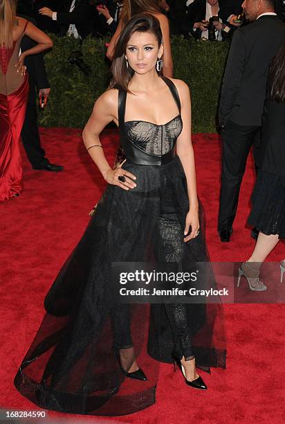 Actress Nina Dobrev attends the Costume Institute Gala for the "PUNK: Chaos to Couture" exhibition at the Metropolitan Museum of Art on May 6, 2013...