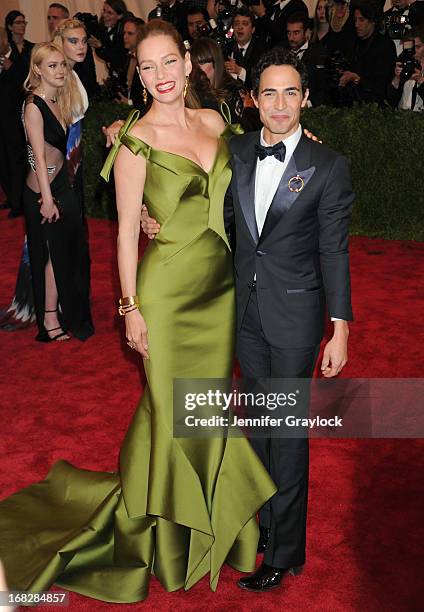 Actress Uma Thurman and Fashion designer Zac Posen attend the Costume Institute Gala for the "PUNK: Chaos to Couture" exhibition at the Metropolitan...