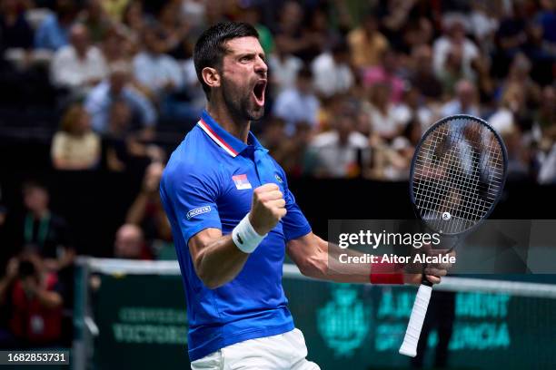 Novak Djokovic of Serbia celebrates after winning his game against Alejandro Davidovich Fokina of Spain during the match between Spain and Serbia...