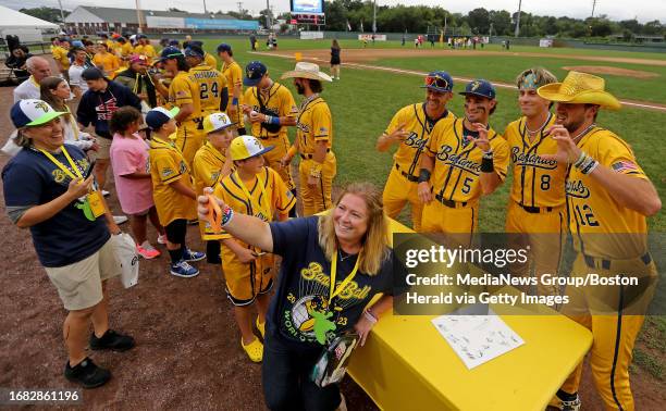 Brockton, Mass., August 16, 2023: Fans have thier picture taken with the team as the Savannah Bananas take on the Party Animals at Campanelli Stadium...