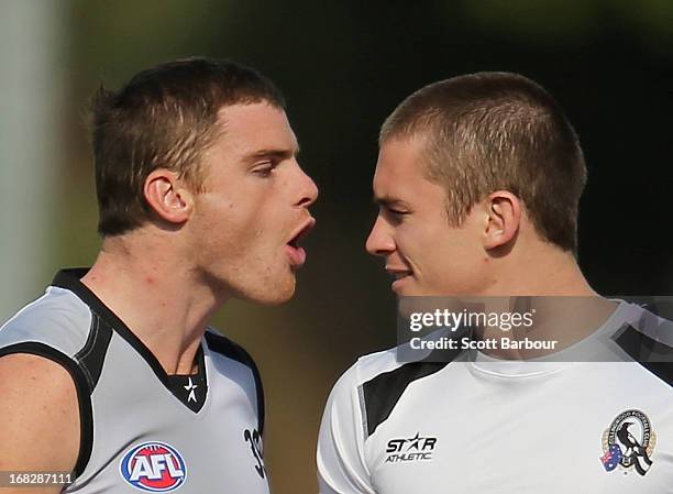 Heath Shaw and Dayne Beams of the Magpies talk during a Collingwood Magpies AFL training session at Olympic Park on May 8, 2013 in Melbourne,...