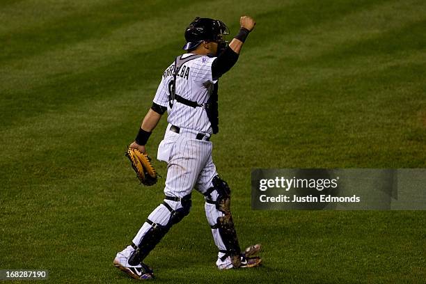 Catcher Yorvit Torrealba of the Colorado Rockies celebrates after the final out of the game against the New York Yankees at Coors Field on May 7,...