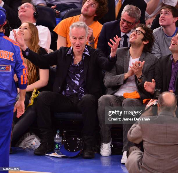 John McEnroe and Josh Groban attend the New York Knicks vs Indiana Pacers NBA Playoff Game at Madison Square Garden on May 7, 2013 in New York City.