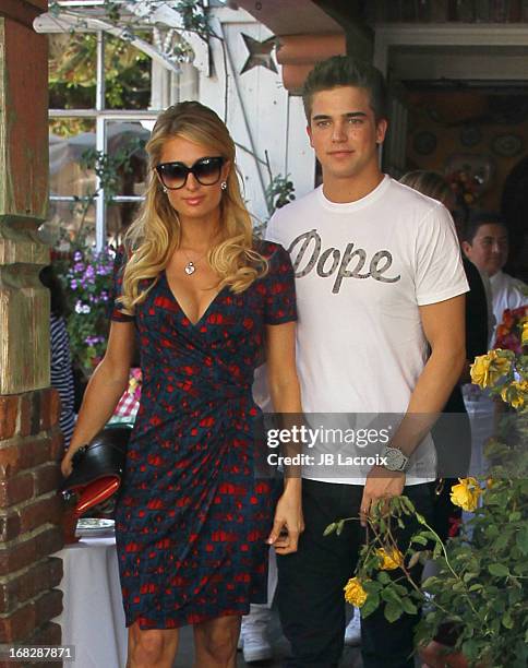 Paris Hilton and River Viiper are seen at The Ivy on May 7, 2013 in Los Angeles, California.