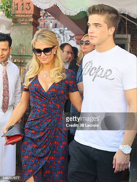 Paris Hilton and River Viiper are seen at The Ivy on May 7, 2013 in Los Angeles, California.