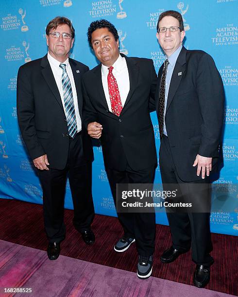 Director of photography for NFL Films Hank McElwee, director of Sound for NFL Films Scott Carter and Alan Sandro attend the 34th Annual Sports Emmy...