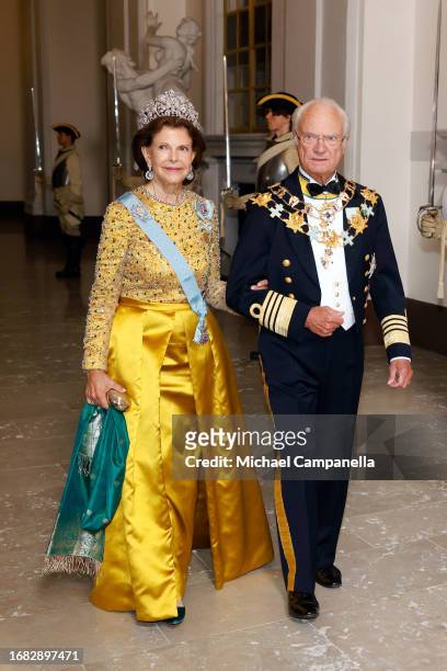 Queen Silvia of Sweden and King Carl XVI Gustaf of Sweden attend the Jubilee banquet during the celebration of the 50th coronation anniversary of...