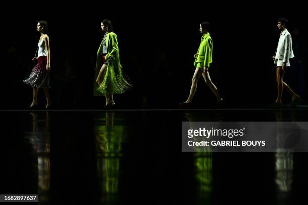 Models walk the runway of the Gucci fashion show during the Milan Fashion Week Womenswear Spring/Summer 2024 on September 22, 2023 in Milan.