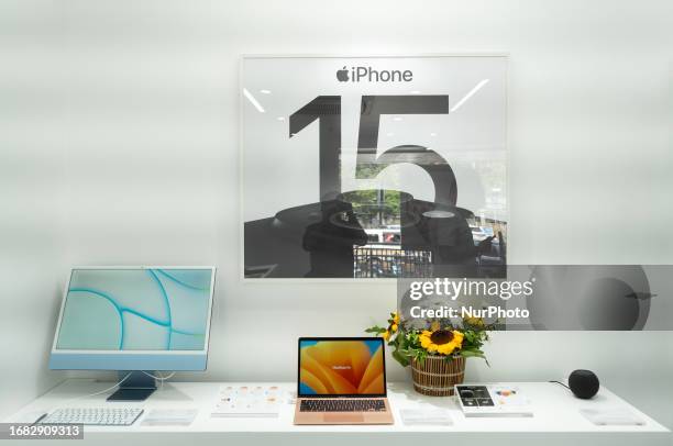 Apple iPhone 15 series smartphone banner installed in an Apple authorised reseller store iTech during the devices first day of sale in Guwahati,...