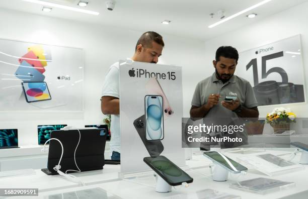Apple iPhone 15 series smartphones displayed in an Apple authorised reseller store iTech during the devices first day of sale in Guwahati, Assam,...