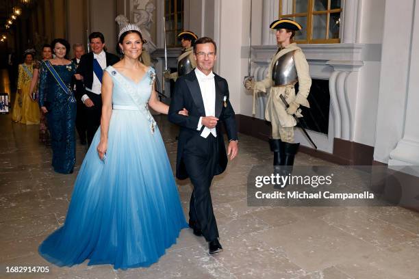 Crown Princess Victoria of Sweden and Prime Minister of Sweden Ulf Kristersson attend the Jubilee banquet during the celebration of the 50th...