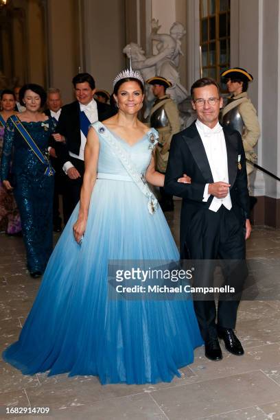 Crown Princess Victoria of Sweden and Prime Minister of Sweden Ulf Kristersson attend the Jubilee banquet during the celebration of the 50th...