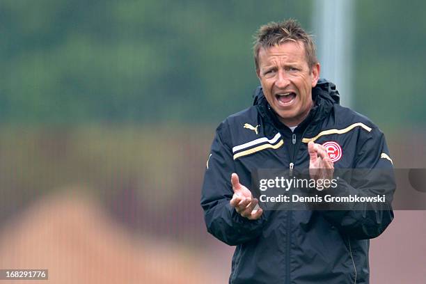 Head coach Norbert Meier reacts during a Fortuna Duesseldorf training session at Arena Sport Park on May 8, 2013 in Duesseldorf, Germany.