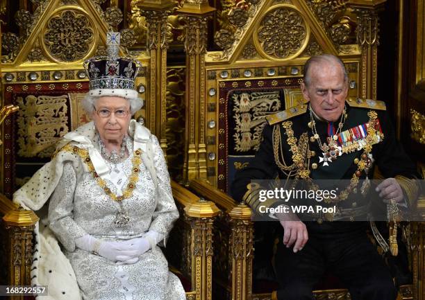 Britain's Queen Elizabeth II and Prince Phillip, Duke of Edinburgh attend the State Opening of Parliament on May 8, 2013 in London, England. Queen...