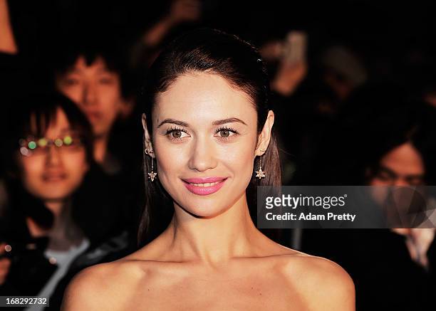 Olga Kurylenko poses for photographs and signs autographs while attending the 'Oblivion' Japan Premiere at Roppongi Hills on May 8, 2013 in Tokyo,...
