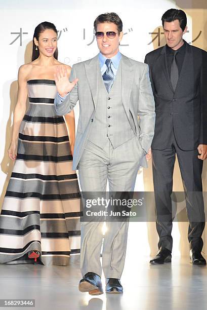 Olga Kurylenko, Tom Cruise and director Joseph Kosinski attend the 'Oblivion' Japan Premiere at Roppongi Hills on May 8, 2013 in Tokyo, Japan. The...