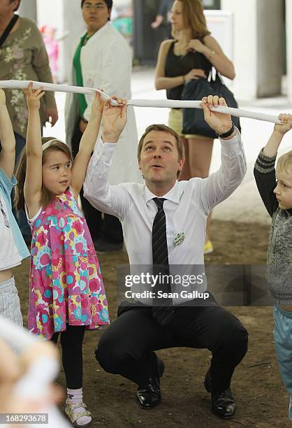 German Health Minister Daniel Bahr plays with children at the Teddy Bear Clinic at Charite Hospital on May 8, 2013 in Berlin, Germany. Charite...