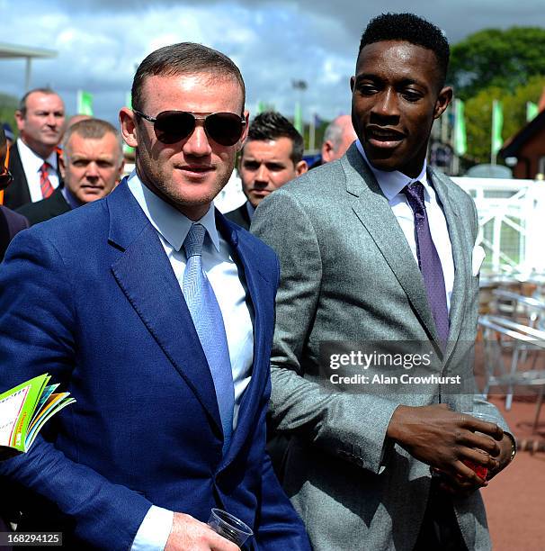 Manchester United players Wayne Rooney and Danny Welbeck arrive at Chester racecourse on May 08, 2013 in Chester, England.