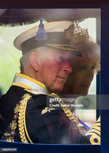 Prince Charles, Prince of Wales and Camilla, Duchess of Cornwall travel by carriage to the State Opening of Parliament on May 8, 2013 in London,...