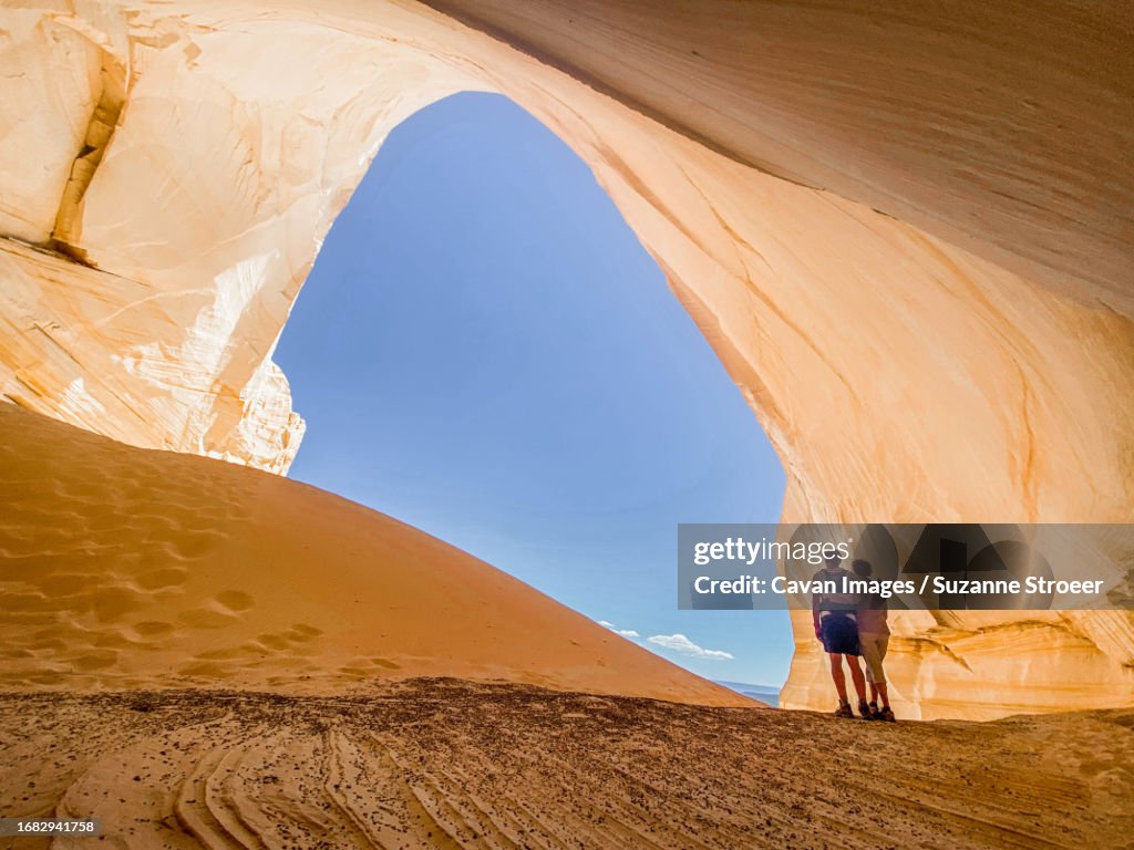 A couple enjoying the Great Chamber aka Cutler Cove
