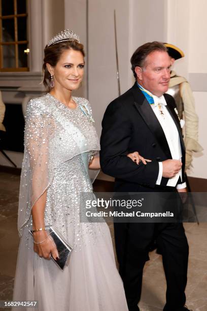 Princess Madeleine of Sweden and Christopher O'Neil attend the Jubilee banquet during the celebration of the 50th coronation anniversary of King Carl...