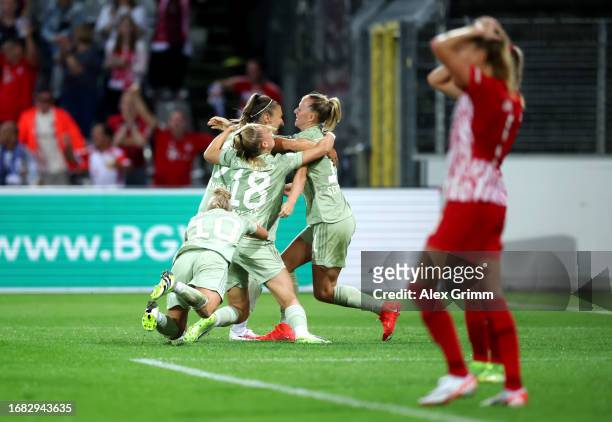 Katharina Elisa Naschenweng of FC Bayern München celebrates with teammates after scoring the team's second goal during the Google Pixel Women's...
