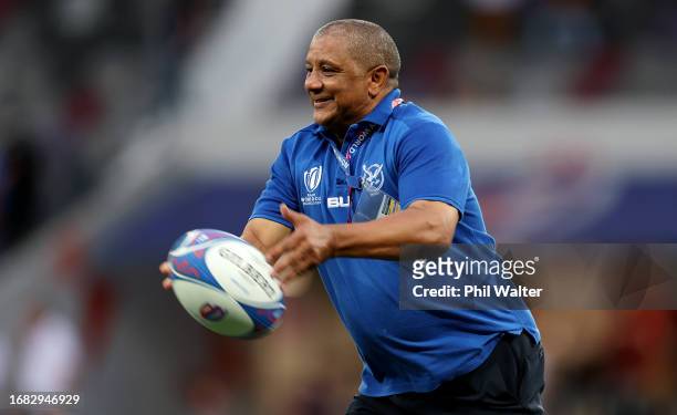 Allister Coetzee, Head Coach of Namibia, passes the ball prior to the Rugby World Cup France 2023 match between New Zealand and Namibia at Stadium de...