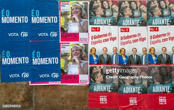 Political posters of different parties standing in general and local elections, city of Vigo, Galicia, Spain.