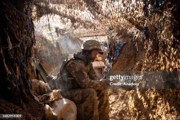Ukrainian serviceman of 24th brigade is seen at frontline positions at south of Bakhmut as the war between Russia and Ukraine continues in Toretsk,...