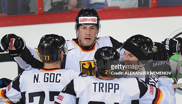 Germany's players celebrate scoring during a preliminary round game Austria vs Germany of the IIHF International Ice Hockey World Championship in...