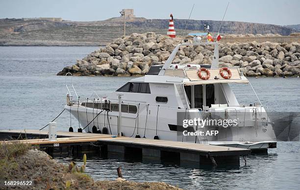 The motor yacht "El Pirata" upon which five French nationals were holidaying is pictured on May 8, 2013 at Mgarr harbor in Gozo, one of three islands...